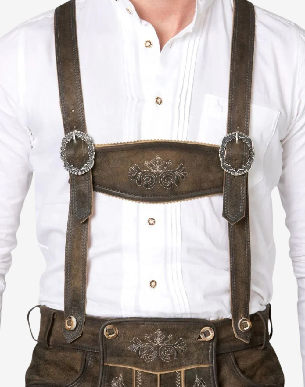 Close up of suspenders and chest panel on mens Bavarian leather shorts set with embossed detailing
