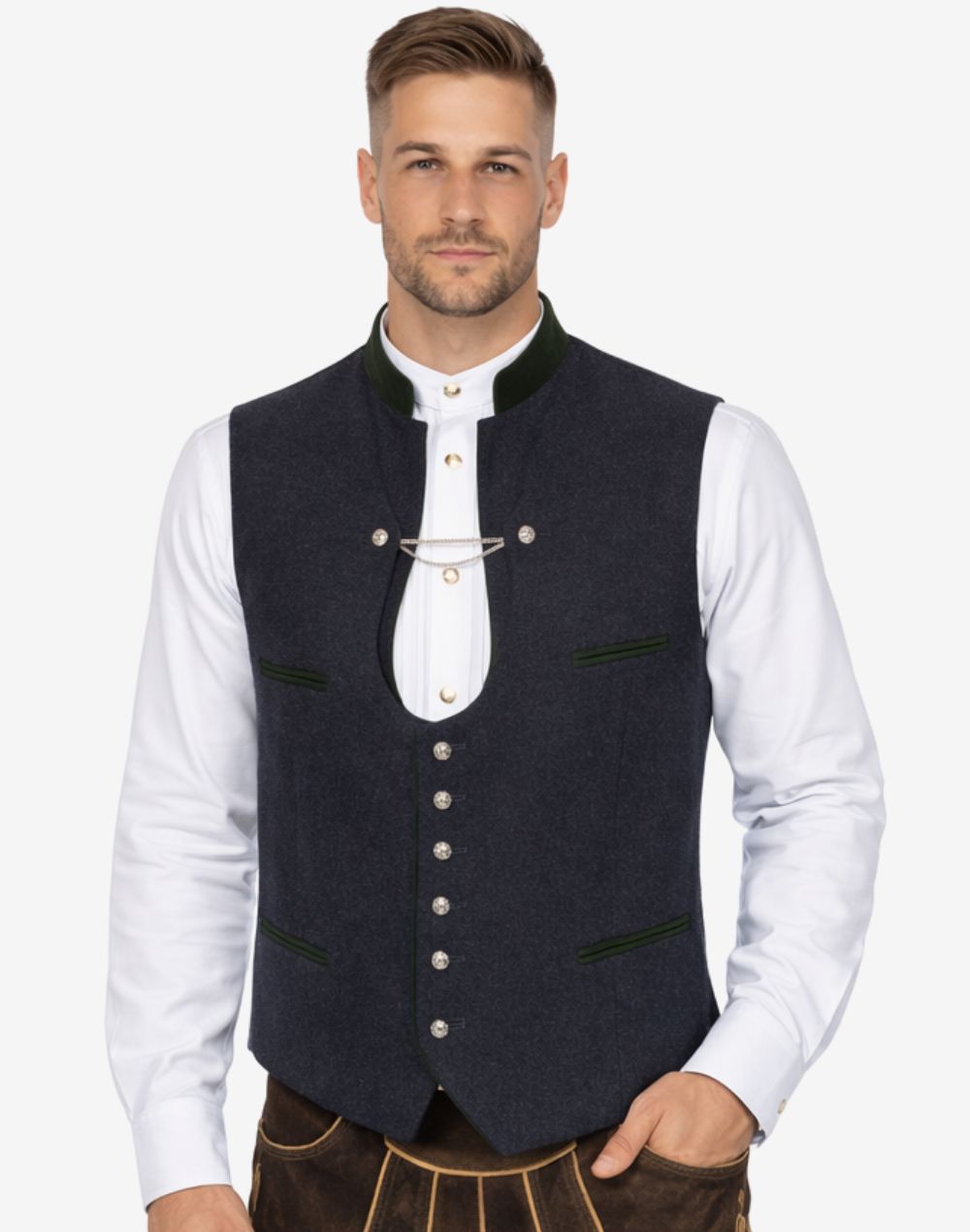 Model wearing mens blue wool Bavarian vest paired with traditional white shirt and lederhosen for Oktoberfest outfit.
