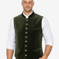 Model wearing mens classic velvet German vest paired with shirt and lederhosen for traditional Oktoberfest outfit.
