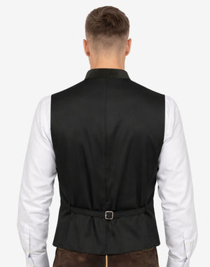 Back view of mens elegant Trachten vest with adjustable strap and classic Bavarian Alpine tailoring for traditional wear.