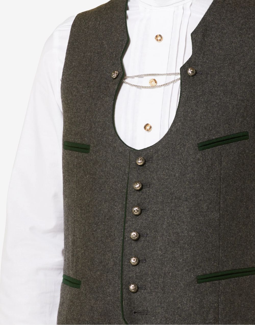 Close up of mens elegant Trachten vest showing vintage brown fabric, decorative metal buttons and classic Bavarian tailoring.