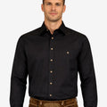 Model wearing Mens German Trachten Shirt in black front view showing button closure, chest pocket and fitted design