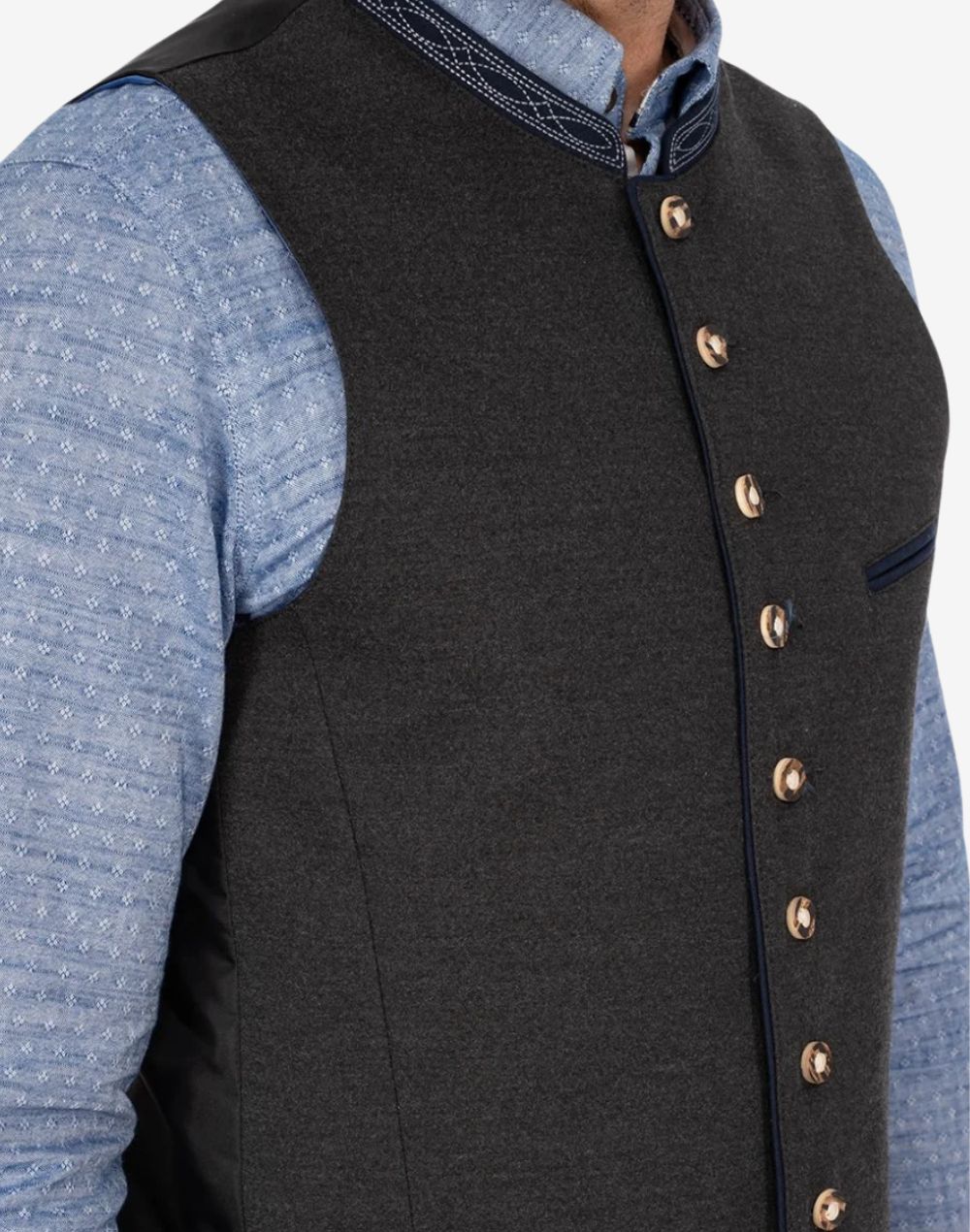 Side detail of dark German Trachten vest with decorative buttons and traditional collar