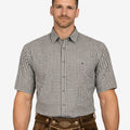Model wearing Mens Heritage Bavarian Shirt front view in black check pattern showing short sleeves and classic fit