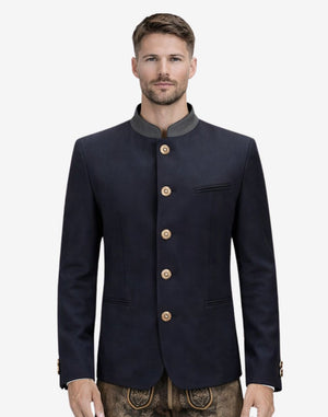 Model wearing heritage blue Oktoberfest jacket for men highlighting Bavarian style, stand collar and traditional German festival outfit.