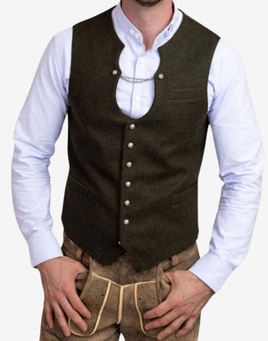 Model wearing heritage wool Trachten vest for men styled with traditional shirt and lederhosen for authentic Oktoberfest outfit.