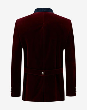 Back view of maroon velvet Trachten jacket for men showing fitted waist strap, structured seams and traditional Bavarian design.