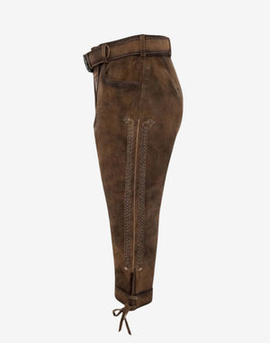 Side view highlighting embroidered leg detail, pocket design and authentic alpine leather craftsmanship.