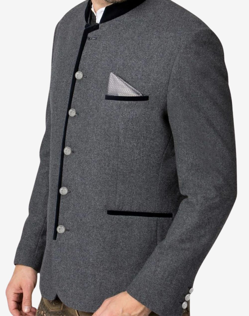Angled view of model wearing grey Trachten jacket highlighting velvet trim, metal buttons and traditional Oktoberfest style.
