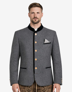 Model wearing grey Trachten jacket front view featuring stand collar, wooden buttons and classic Bavarian festival styling.