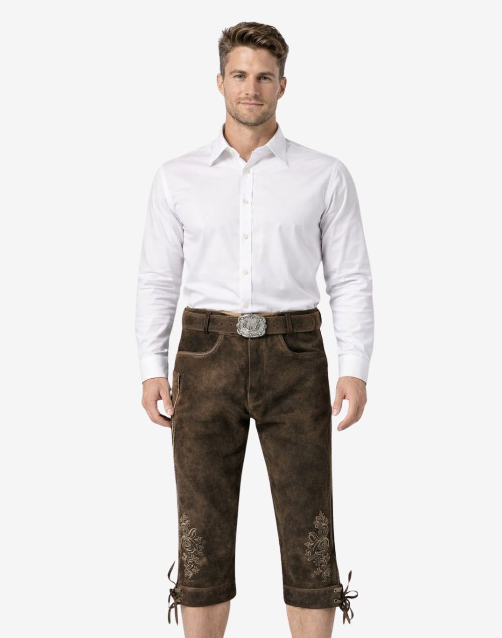 Front view of model wearing mens traditional Alpine Bundhosen in brown leather with Bavarian embroidery and classic knee tie details
