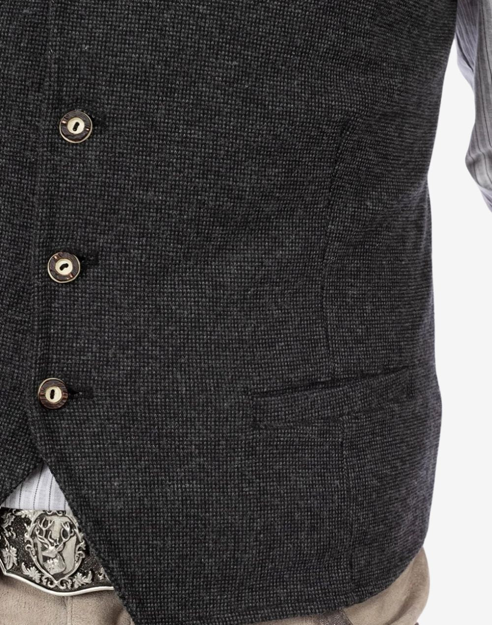 Angled side wearing view of mens traditional alpine vest highlighting tailored cut, premium fabric texture and alpine heritage look