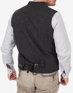 Rear view of mens traditional alpine vest showing adjustable back strap, clean tailoring and traditional alpine vest structure