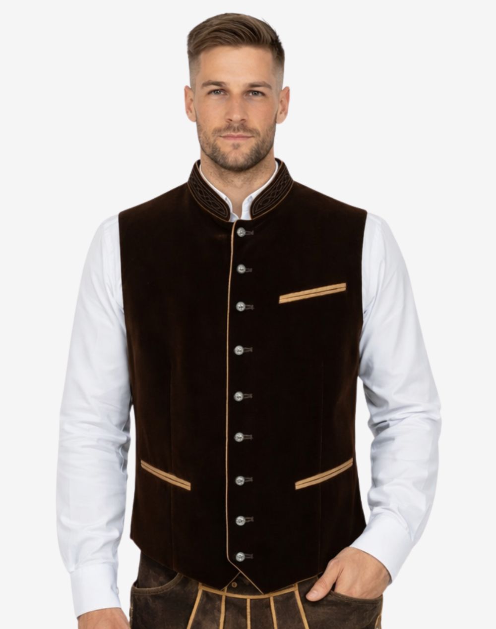 Male model wearing traditional Bavarian vest in brown velvet paired with white shirt and Lederhosen, styled for Oktoberfest festival clothing and Alpine heritage fashion.