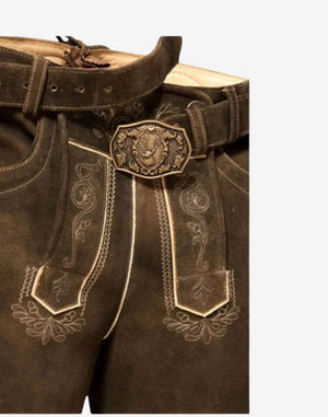Close up of traditional bundhosen waist showing ornate belt buckle, embroidered front flap and detailed stitching on leather material