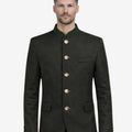 Model wearing winter wool Trachten jacket for men highlighting Bavarian heritage style, stand collar and traditional Oktoberfest outfit.