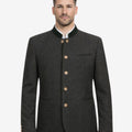 Model wearing classic wool Trachten jacket front view featuring green collar trim, horn buttons and traditional Bavarian fit.