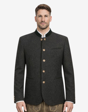 Model wearing classic wool Trachten jacket front view featuring green collar trim, horn buttons and traditional Bavarian fit.