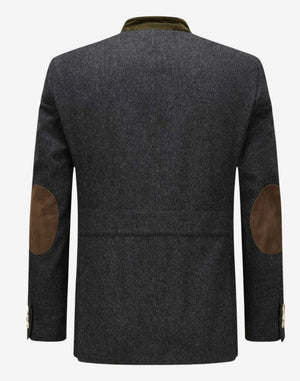 Back view of mens authentic German jacket showing tailored structure, elbow patches and traditional alpine inspired design details