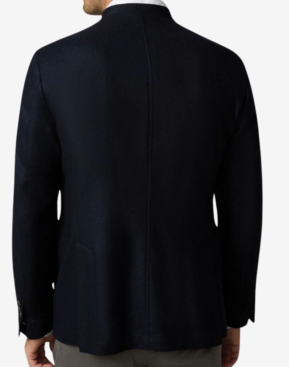 Detailed front view of mens navy blue Trachten jacket highlighting structured tailoring, premium fabric, traditional button closure, chest pockets, and refined Bavarian Oktoberfest style.