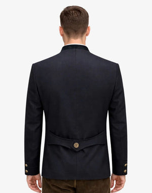 Man wearing a navy blue blazer with gold buttons on a white background