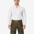 Model wearing Oktoberfest leather shorts for men in dark brown leather with Bavarian embroidery and belt buckle