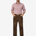 Man wearing a red checkered shirt and brown pants on a white background