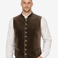 Model wearing Oktoberfest ready vest for men paired with traditional shirt and lederhosen for authentic Bavarian festival outfit.