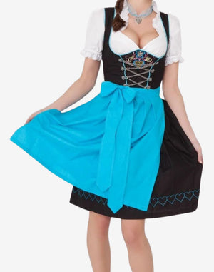 Front view of model wearing Oktoberfest ready dirndl dress featuring black bodice, blue apron bow and traditional alpine styling