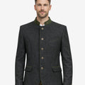 Front of model wearing Oktoberfest Trachten jacket showing traditional buttons, stand collar and authentic alpine design.