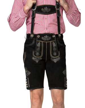 Suspenders detail on premium alpine lederhosen shows embossed bib plate metal rings and textured leather straps