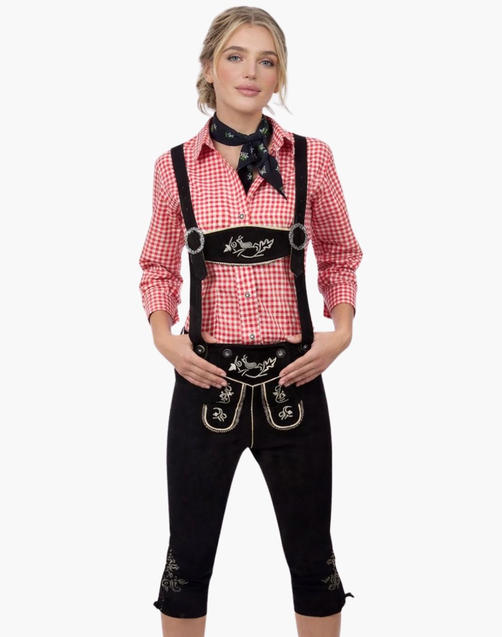 Woman wearing a traditional Bavarian outfit with a red checkered shirt and black bundhosen on a white background.