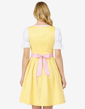 Back view of model wearing premium German dirndl dress featuring pleated skirt, apron tie and traditional structure