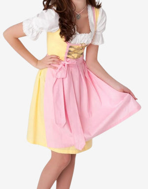 Side view of model wearing premium German dirndl dress showing apron bow, fitted waist and embroidered alpine styling