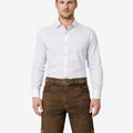 Model wearing premium mens Oktoberfest lederhosen in brown leather with Bavarian embroidery and traditional belt buckle for festival attire