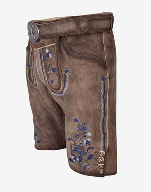 Men’s Oktoberfest lederhosen made from brown leather featuring detailed blue embroidery on the thighs and buttoned leg hems