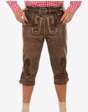 Front wearing view of premium Oktoberfest bundhosen for men displaying authentic leather texture, embroidered panels and classic Bavarian fit