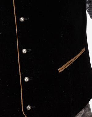 Close-up of black velvet Oktoberfest vest showing decorative metal buttons, beige pocket trim and traditional Bavarian design.