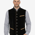 Model wearing premium Oktoberfest vest in black velvet with traditional shirt and Lederhosen for Bavarian festival outfit.