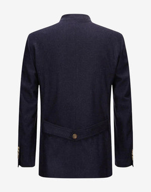 Back view of rustic alpine Trachten jacket for men showing structured seams and classic Bavarian Trachten tailoring.