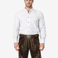 Model wearing rustic brown lederhosen for men with traditional Bavarian embroidery and classic belt buckle