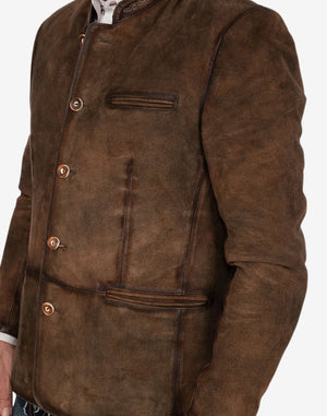 Close-up side view of rustic brown suede Trachten jacket highlighting premium suede texture, tailored fit, and traditional button detailing.