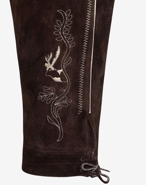 Close-up of side embroidery on rustic leather bundhosen highlighting stitched deer motif, decorative pattern and leather texture