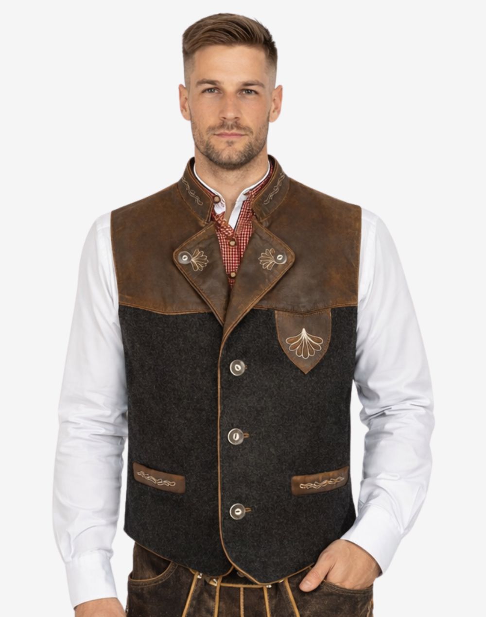 Model wearing rustic German Trachten vest with leather details, wool body and traditional Bavarian Oktoberfest styling.