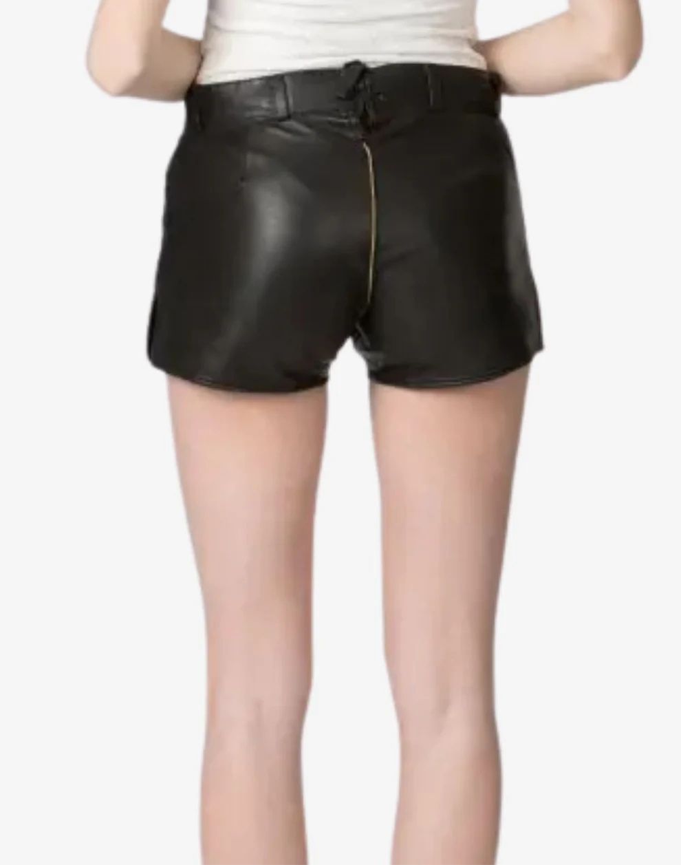 Black leather shorts worn by a person on a white background