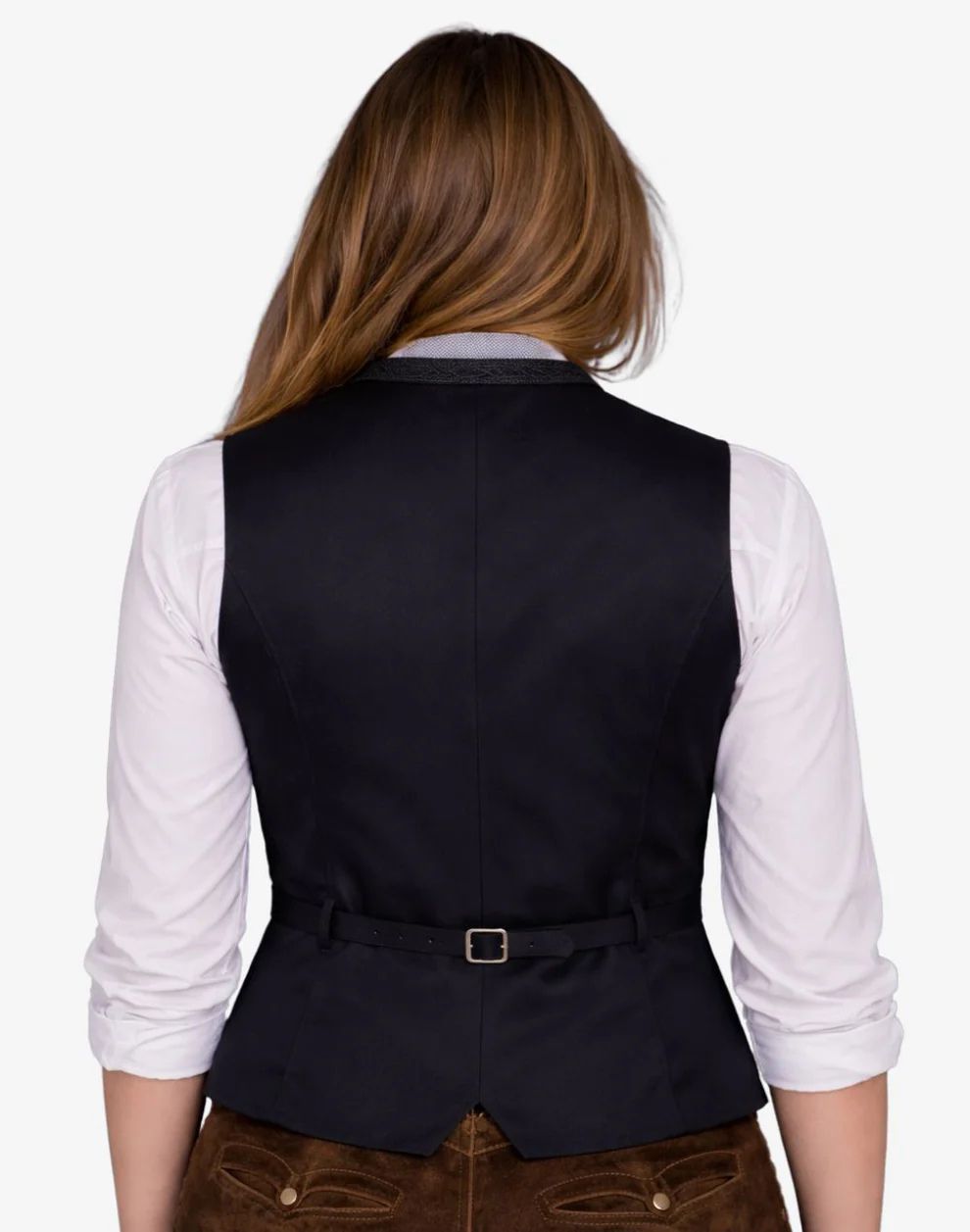 Person wearing a black vest over a white shirt on a white background