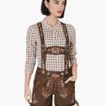 Woman wearing a traditional Bavarian outfit with a checkered shirt and brown shorts on a white background