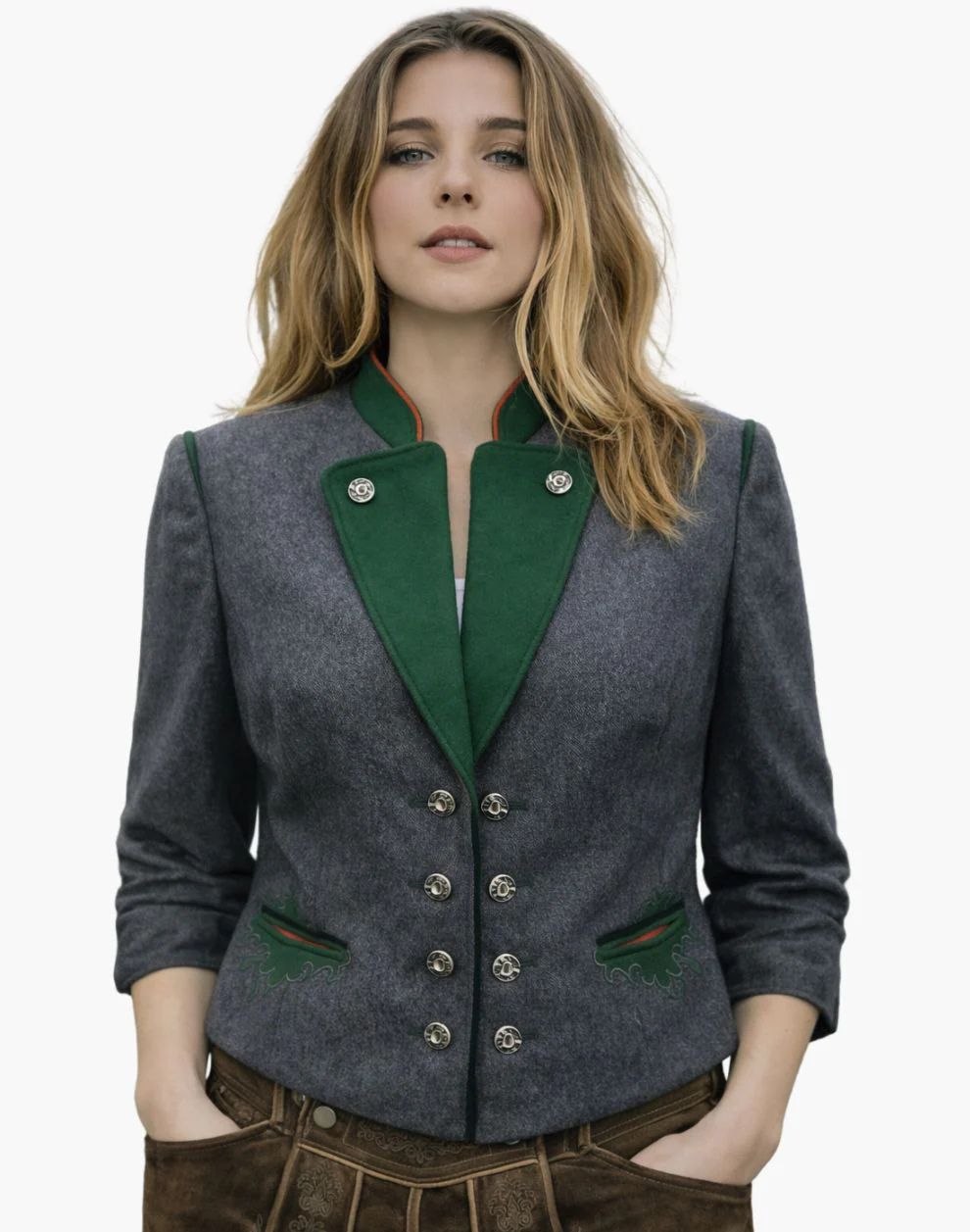 Woman wearing a gray blazer with green lapels on a white background