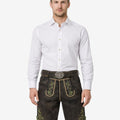 Model wearing traditional Bavarian leather shorts for men with green embroidery and classic Oktoberfest belt buckle