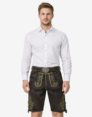 Model wearing traditional Bavarian leather shorts for men with green embroidery and classic Oktoberfest belt buckle